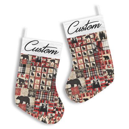 Two socks with bear and plaid pattern on a white background